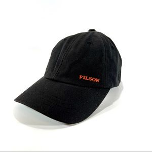Filson oil tin low profile black cap leather strap adjustable
